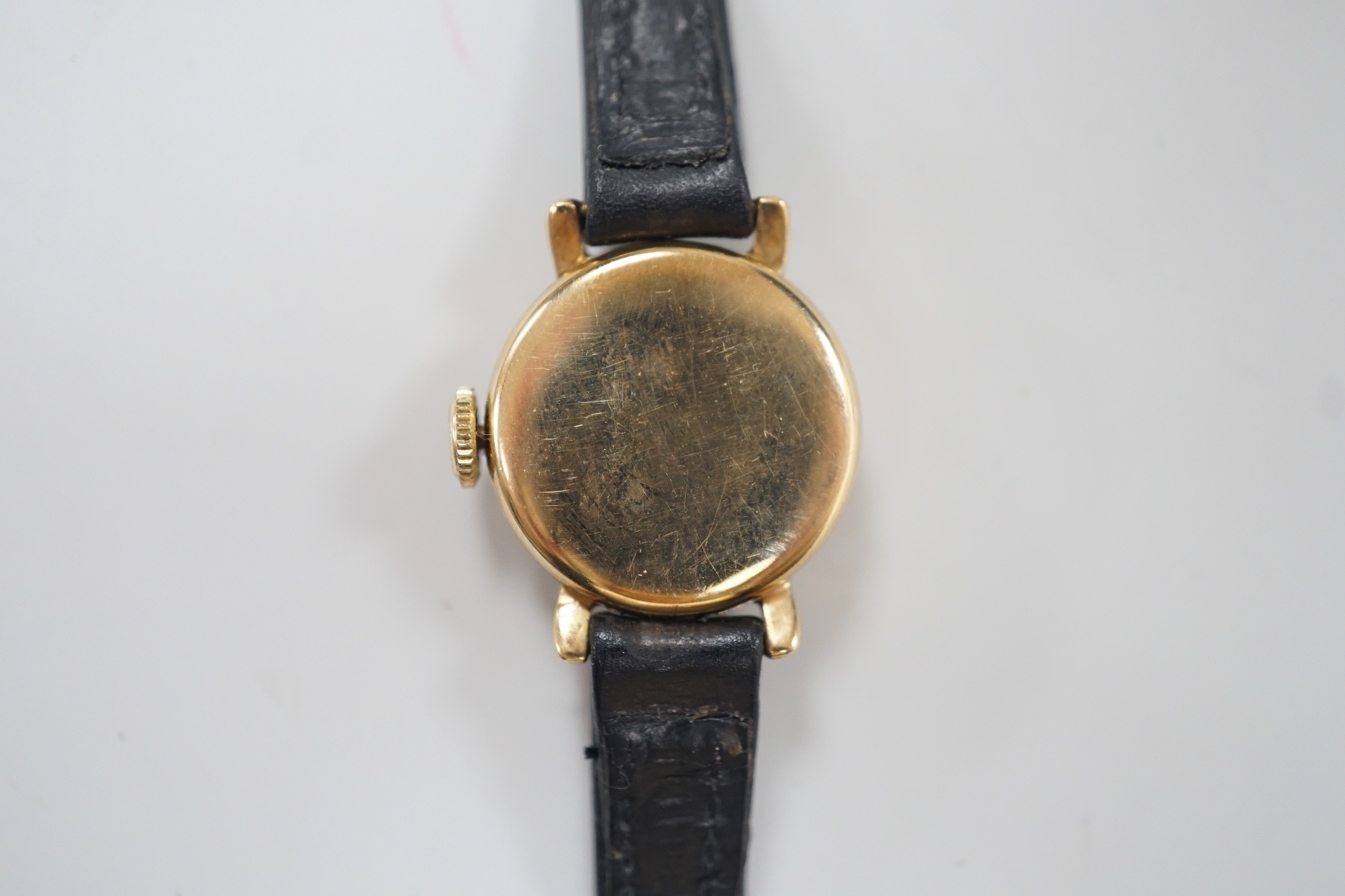 A lady's 1950's 9ct gold Tudor Royal manual wind wrist watch, with Arabic dial and subsidiary seconds, on associated leather strap, case diameter 20mm, with Tudor box.